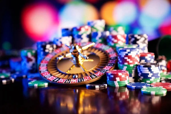 mesir toto app showing live roulette table with professional dealer in multi-camera studio